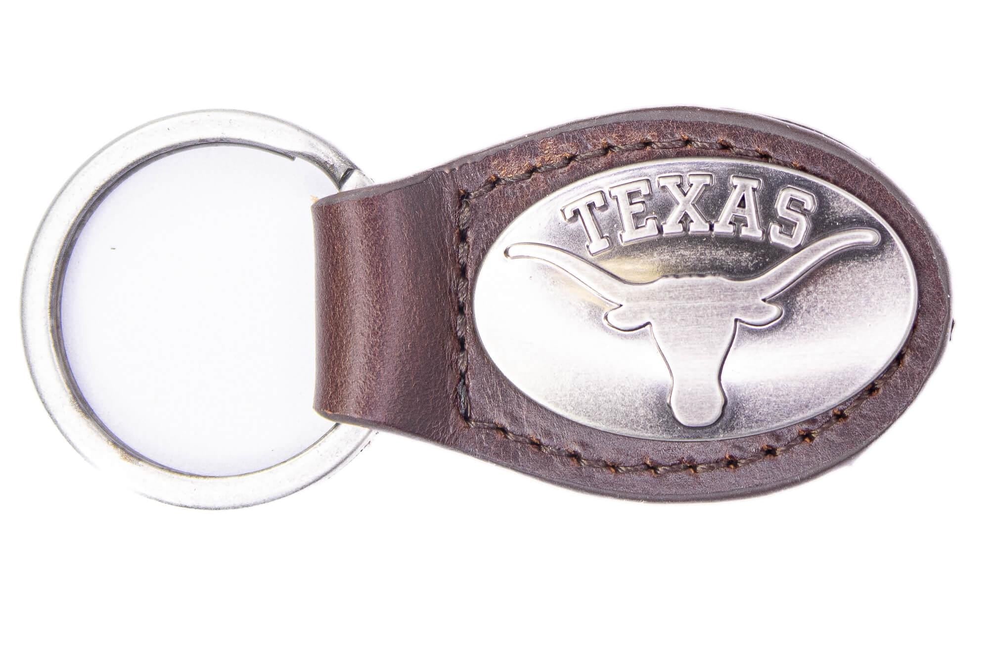Texas Longhorns Oval Leather Key Fob. Sturdy Split Ring and Durable Stitching. Perfect Collegiate Key Chain Gift. Brown or Black Leather.