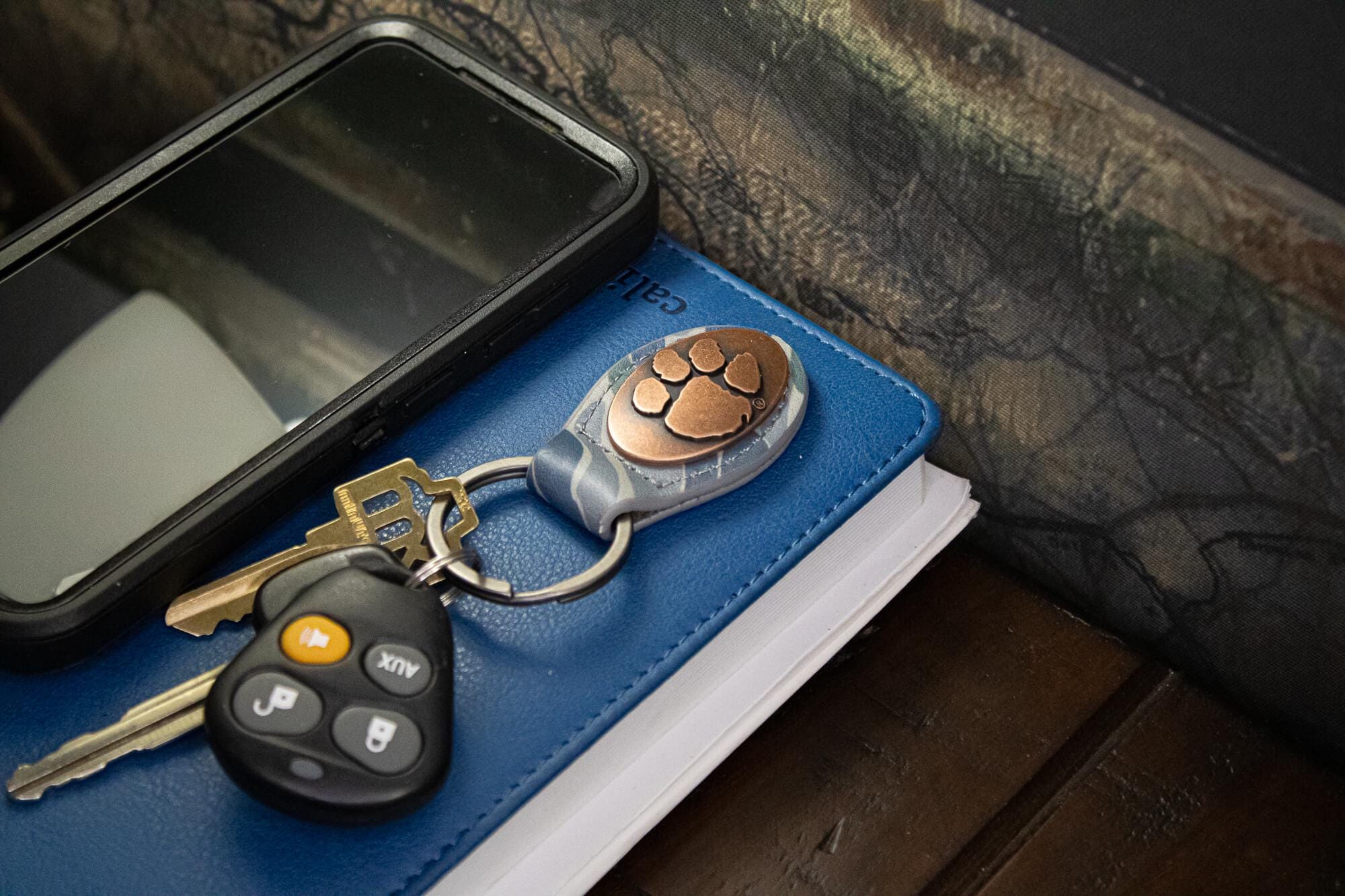 Clemson Tigers Oval Camo Leather Key Fob. Split Ring and Durable Stitching. Perfect Collegiate Key Chain Gift. Old School Camo Key Chain.