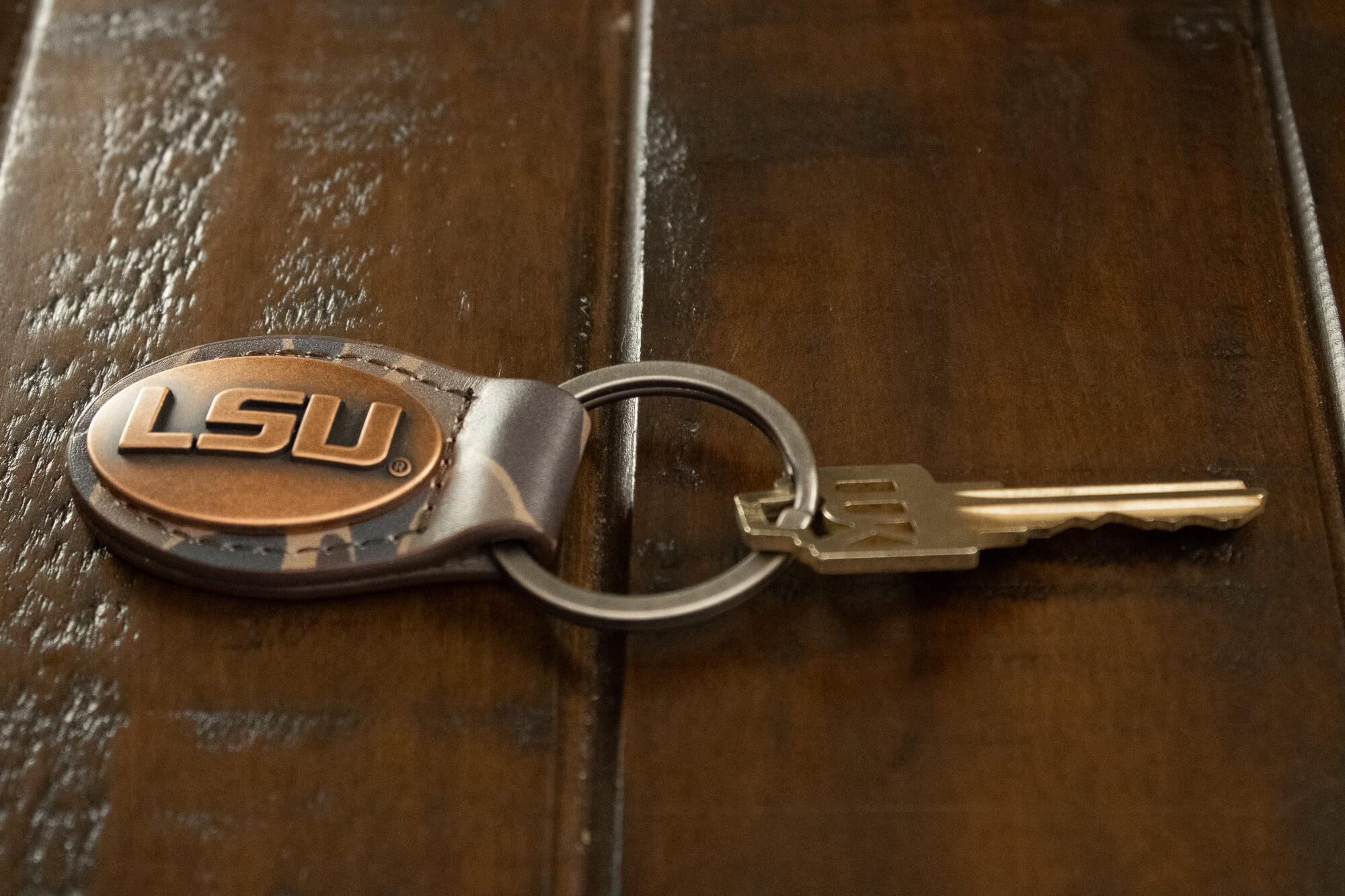 LSU Tigers Oval Camo Leather Key Fob. Split Ring and Durable Stitching. Perfect Collegiate Key Chain Gift. Old School Camo Key Chain.