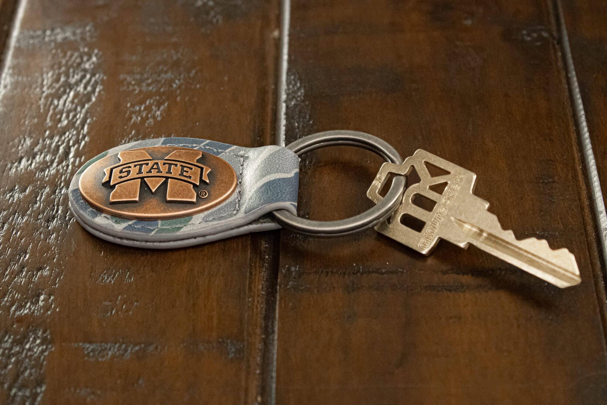 Mississippi State Bulldogs Oval Camo Leather Key Fob. Split Ring and Durable Stitching. Collegiate Key Chain Gift. Old School Camo Key Chain