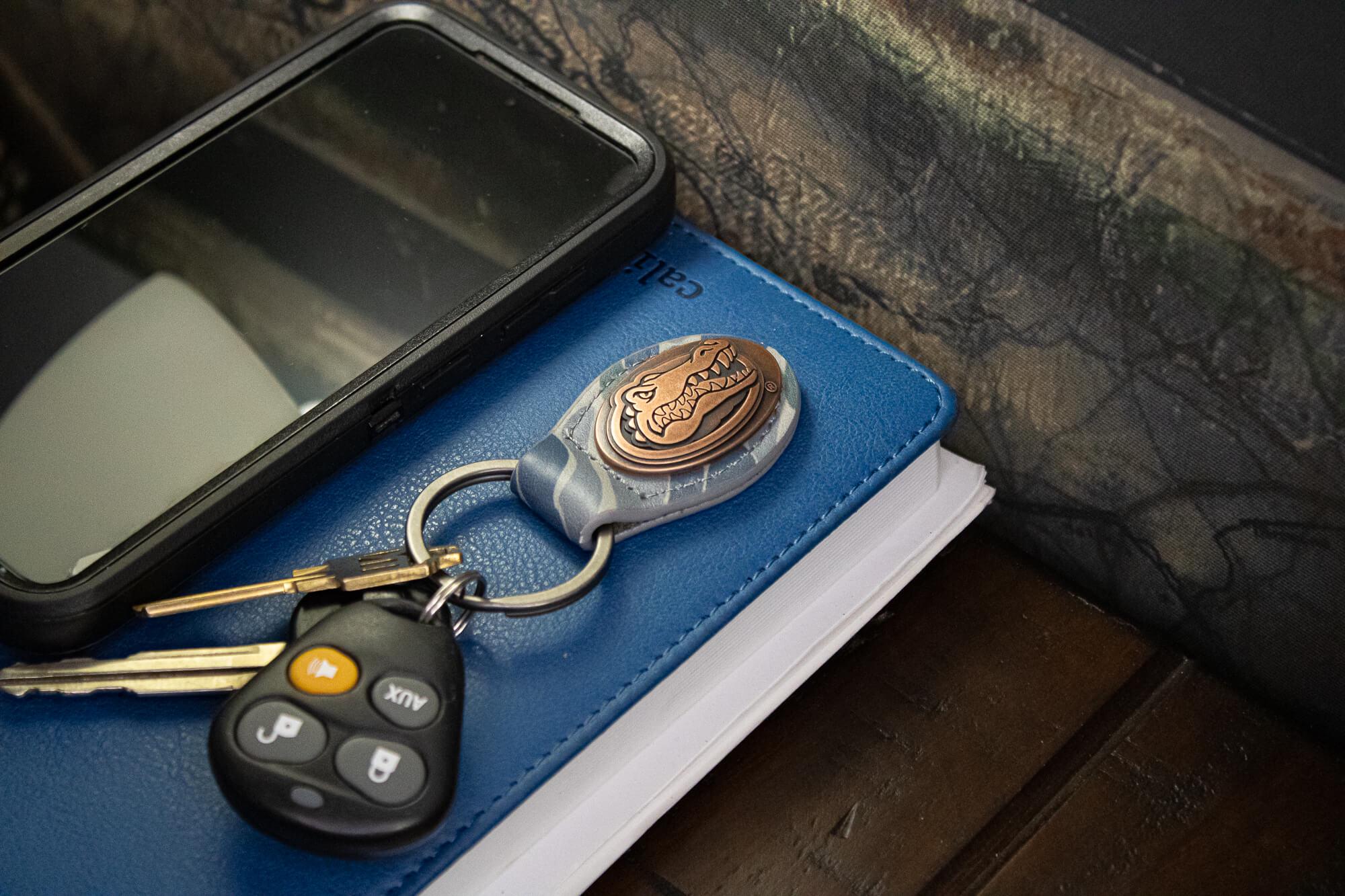 Florida Gators Oval Camo Leather Key Fob. Split Ring and Durable Stitching. Perfect Collegiate Key Chain Gift. Old School Camo Key Chain.