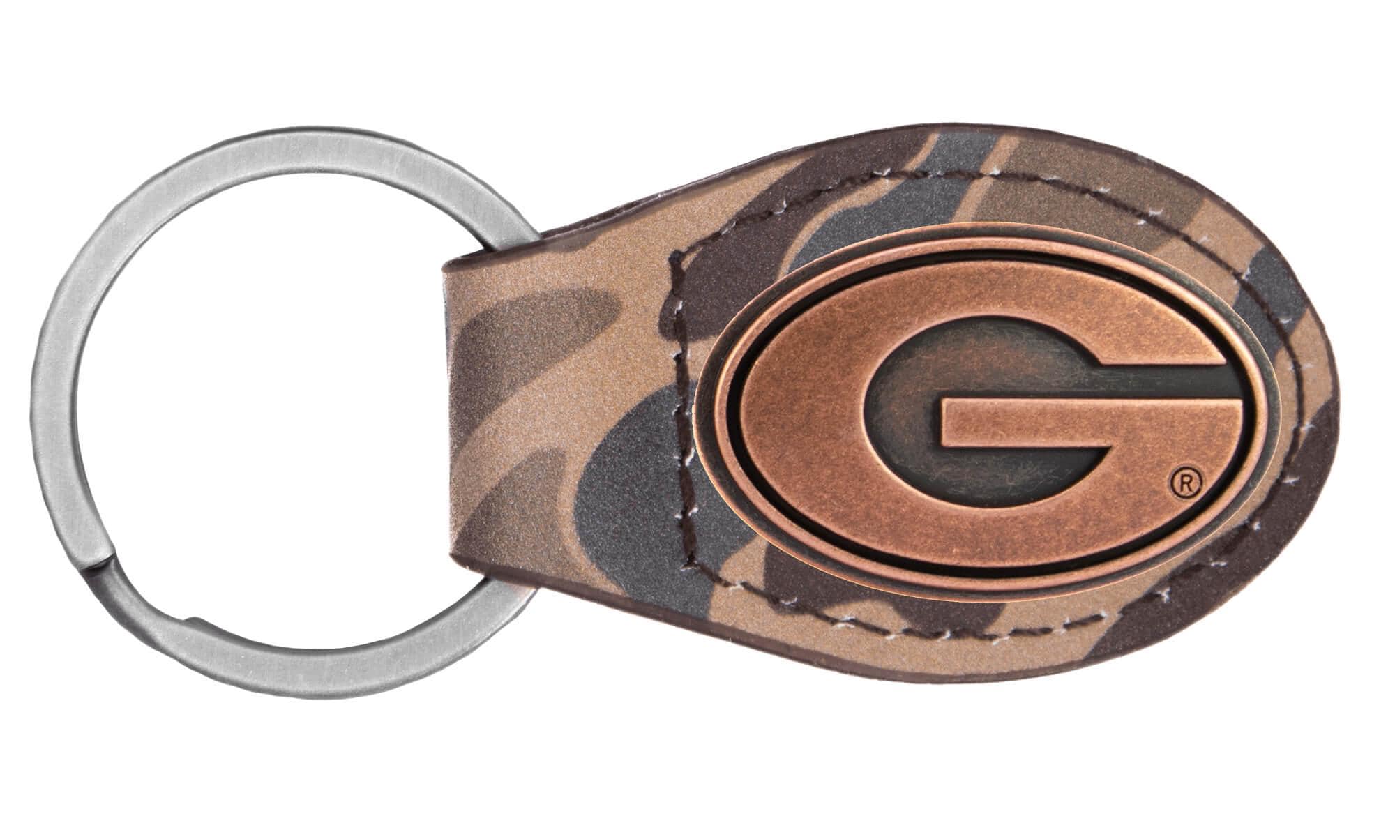 Georgia Bulldogs Oval Camo Leather Key Fob. Split Ring and Durable Stitching. Perfect Collegiate Key Chain Gift. Old School Camo Key Chain.