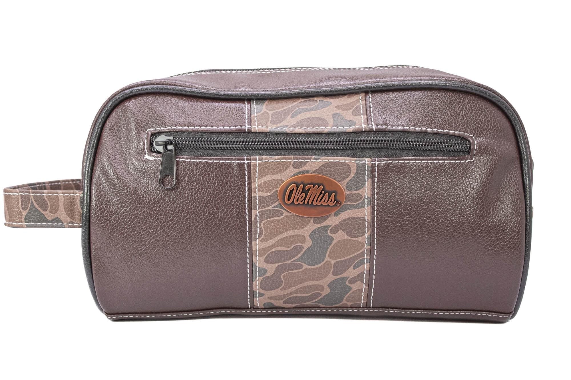 Ole Miss Rebels Men's Camo Dopp Kit. Toiletry Bag. Old School Camo Print. Brown Pebble Finish. Antique Copper Logo. Perfect Travel Accessory
