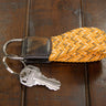 Braided Stretch Woven Orange and Gray Keychain with Leather Accent