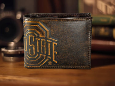 Ohio State Buckeyes Men's Collegiate Bifold Leather Wallet. Brown Burnished Full Grain Finish With Large Debossed Logo