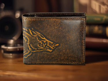 Arkansas Razorbacks Men's Collegiate Bifold Leather Wallet. Brown Burnished Full Grain Finish With Large Debossed Logo