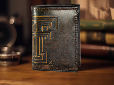 Texas Tech Red Raiders Men's Collegiate Trifold Leather Wallet. Brown Burnished Full Grain Finish With Large Debossed Logo