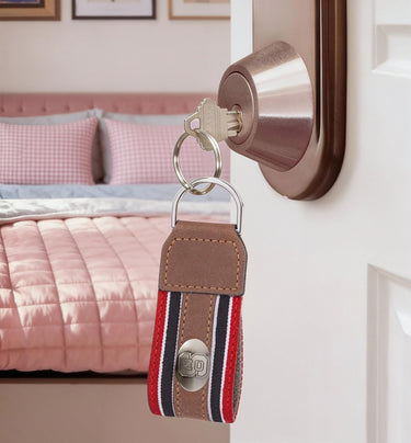 North Carolina State Wolfpack Collegiate Grosgrain Ribbon Key Chain with Leather Accent and Silver Emblem.
