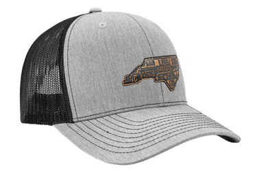 North Carolina Map Leather Patch Trucker Hat. Burnished Full Grain Leather. Snapback Trucker Hat. Richardson 112 Cap. NC Headwear.